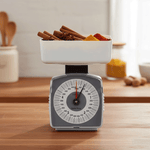 ميزان ميكانيكي مع وعاء