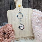 سلسلة مفاتيح بشعار قاتل الشياطين