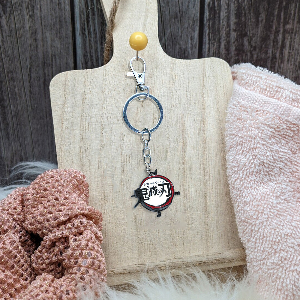 سلسلة مفاتيح بشعار قاتل الشياطين