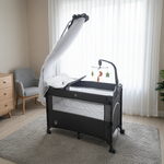 سرير أطفال مع ناموسية وطاولة تغيير