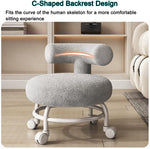 كرسي بتصميم قصير وعجلات من القطيفة