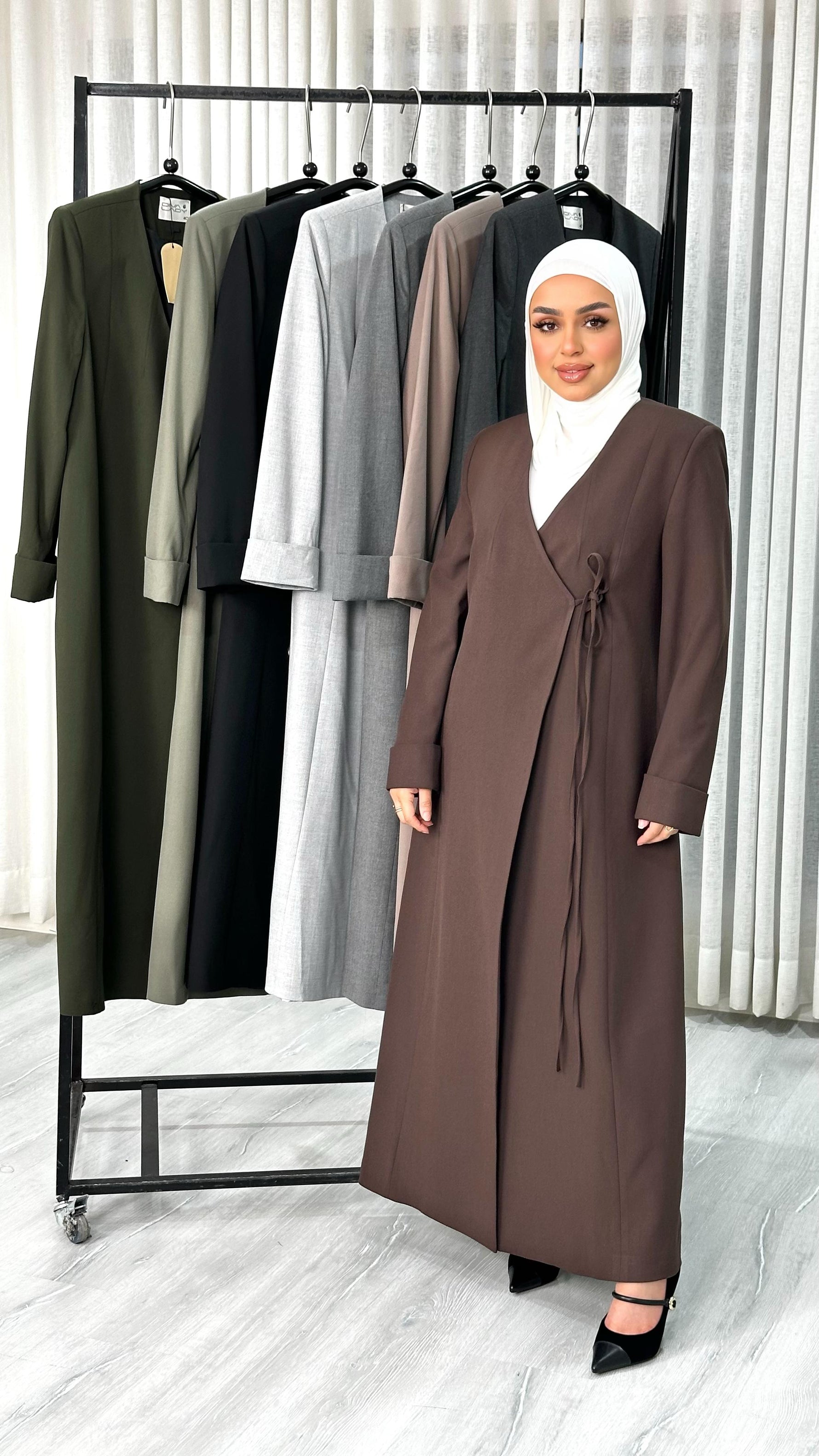 جاكيت نسائي لف طويل