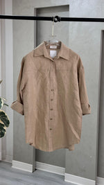 قميص نسائي شبه شفاف