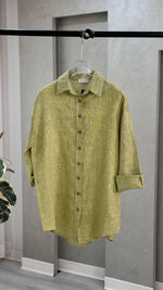 قميص نسائي شبه شفاف