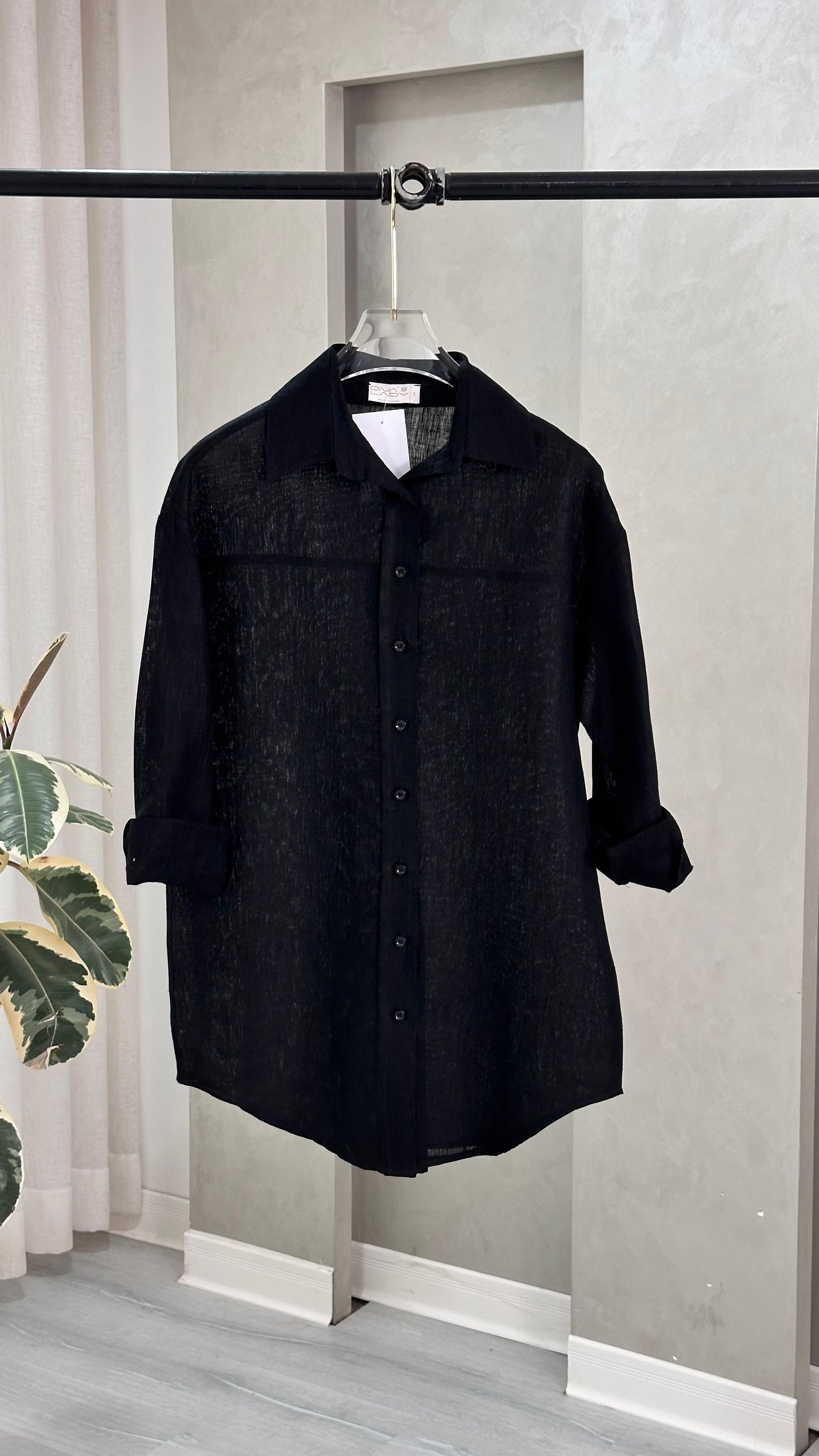 قميص نسائي شبه شفاف