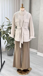 جاكيت نسائي بحيوب وحزام