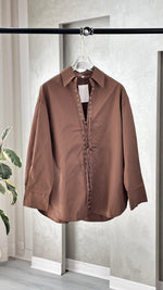 قميص خيط رابطة