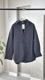 قميص خيط رابطة