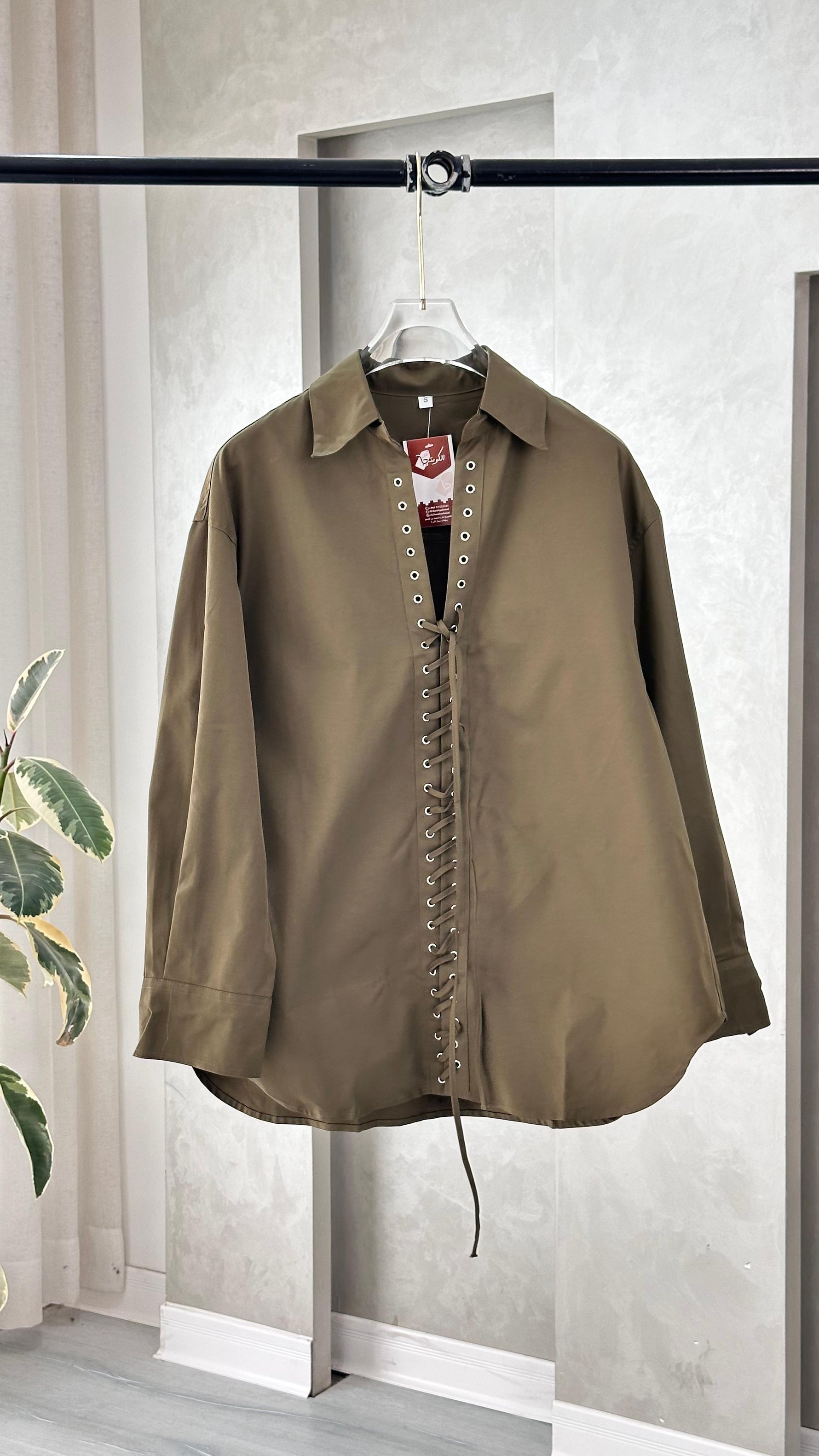 قميص خيط رابطة