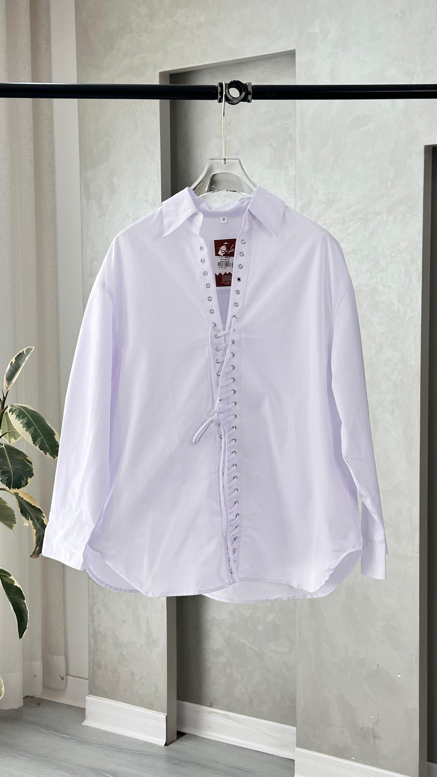 قميص خيط رابطة