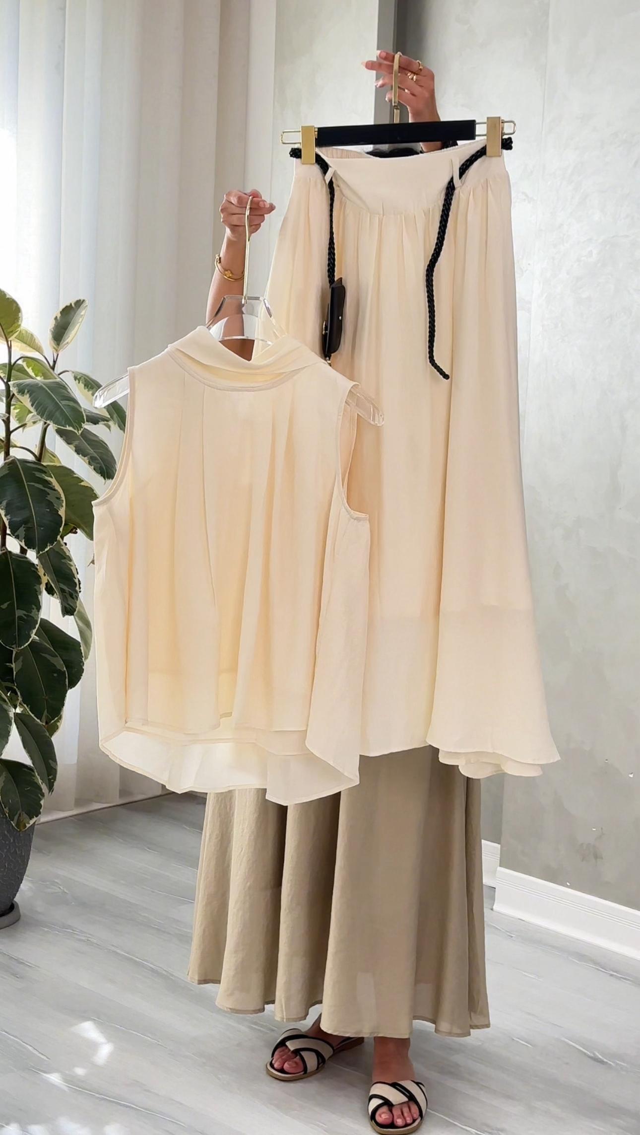 بدلة توب منسدل وتنورة