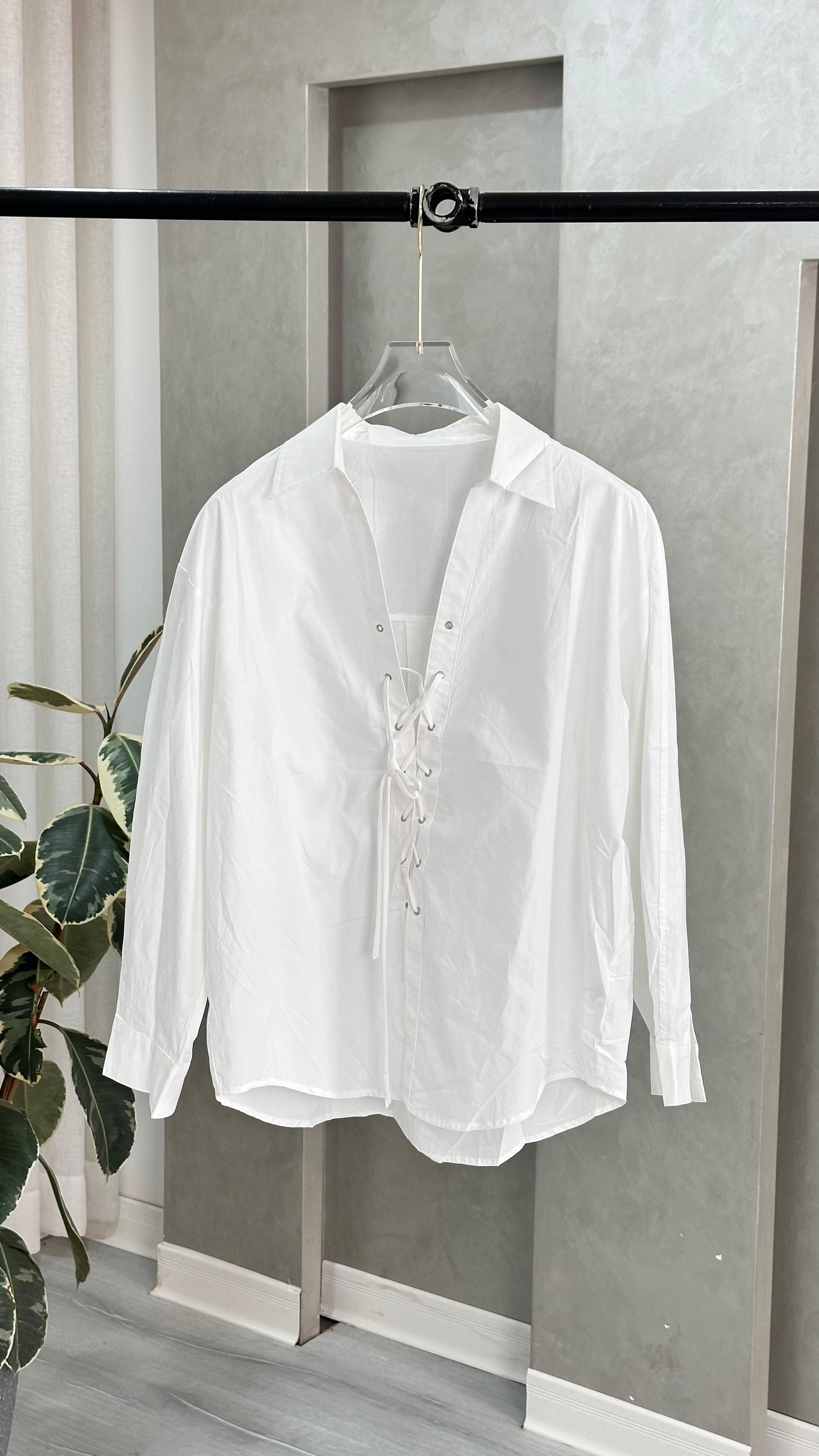 قميص نسائي بازرار