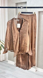 بدلة نسائي مسحبة