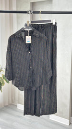 بدلة نسائي مقلم