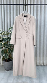 جاكيت نسائي بجيبين