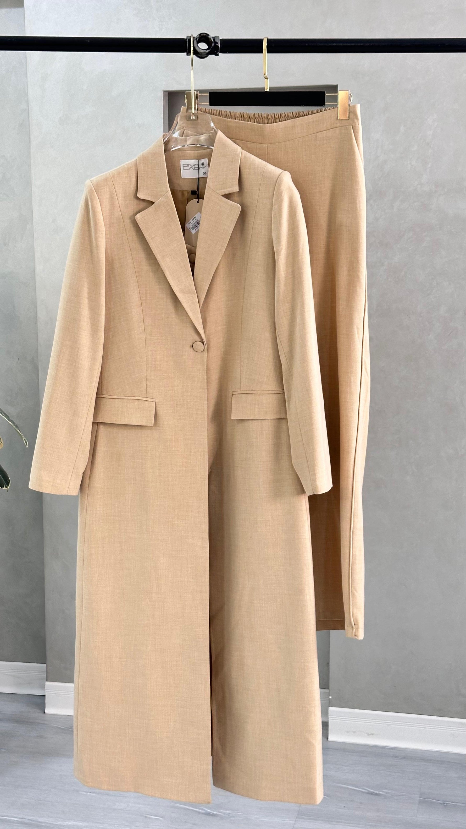 بدلة رسمي علاق