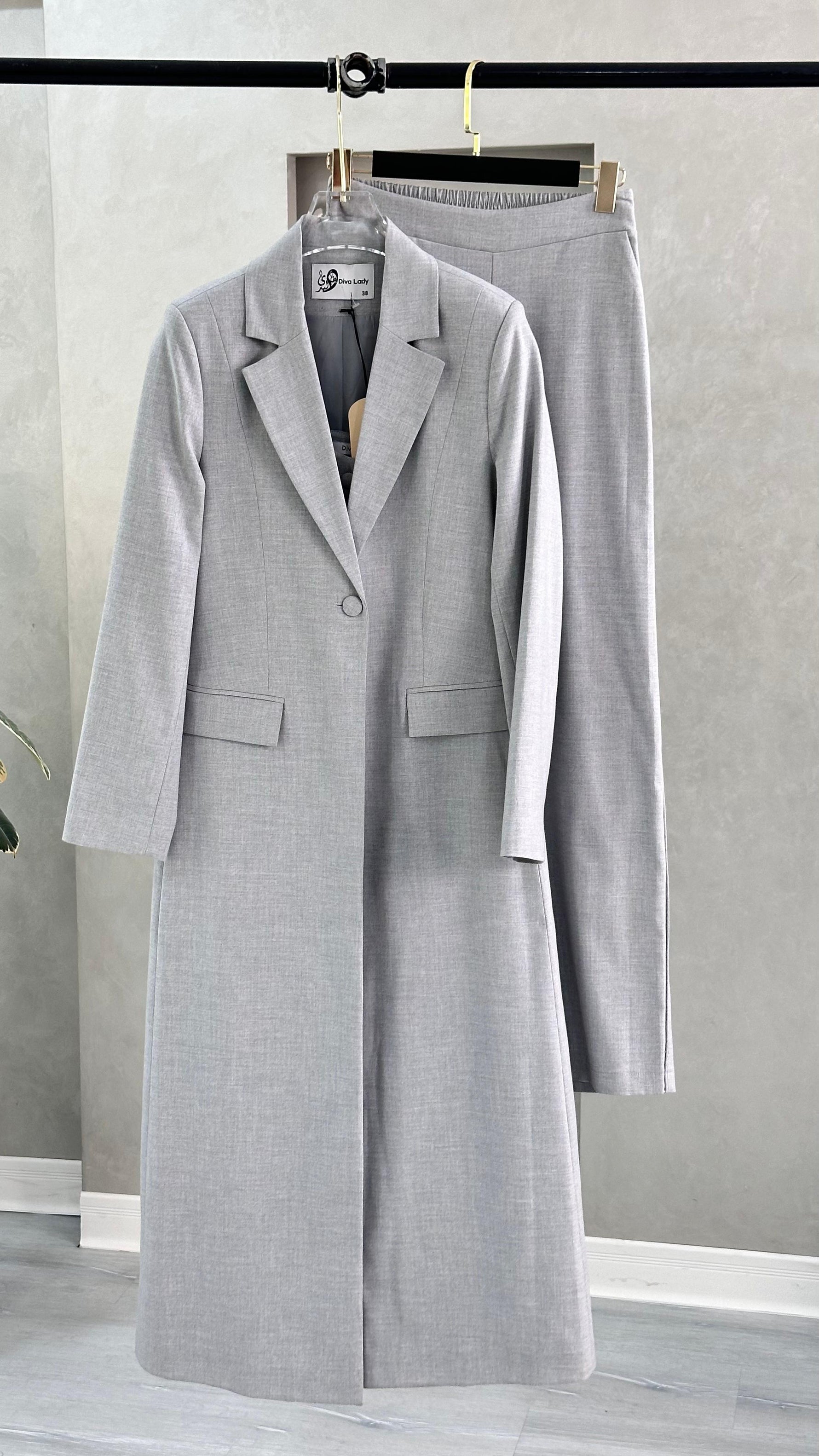 بدلة رسمي علاق