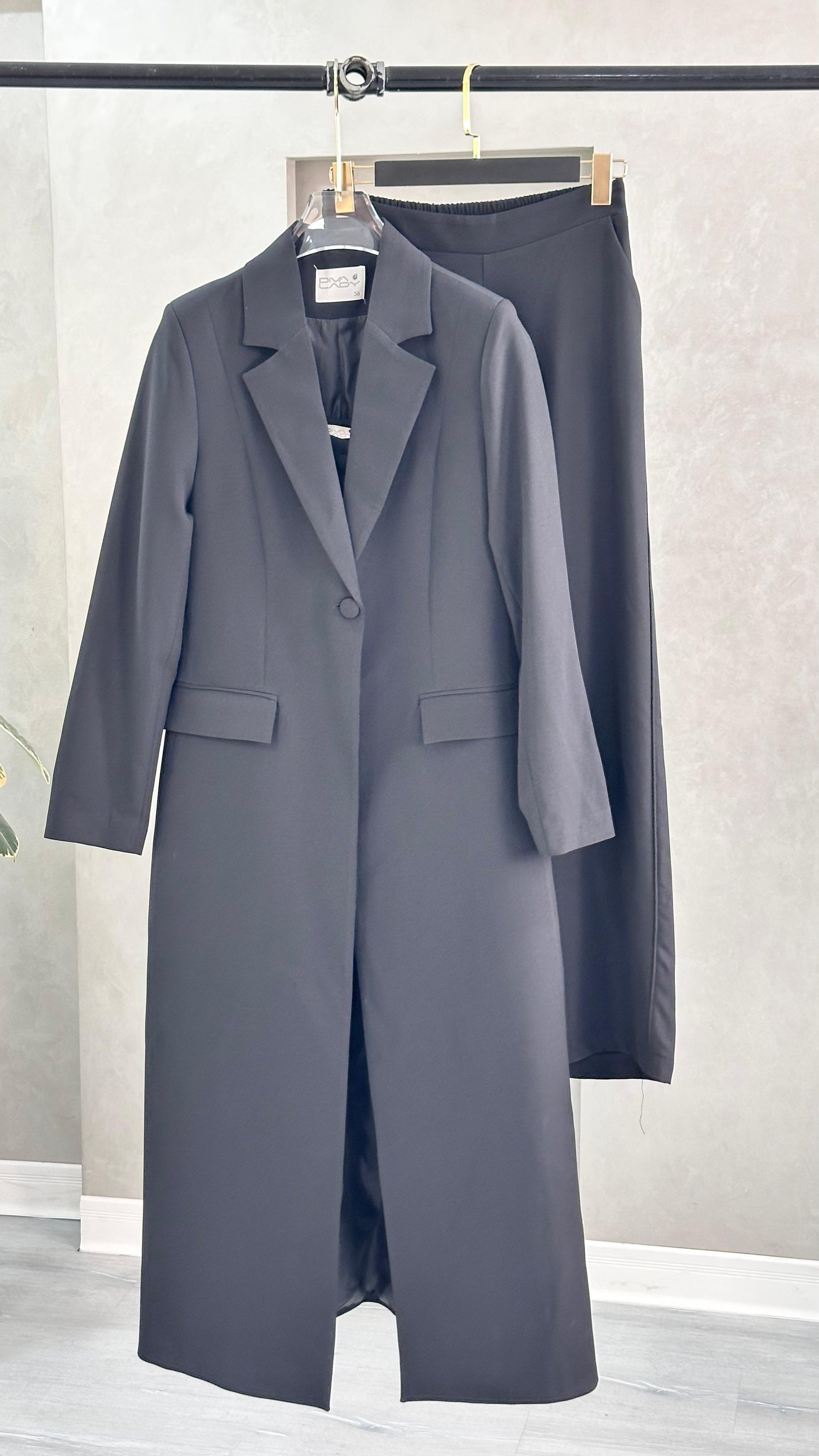 بدلة رسمي علاق