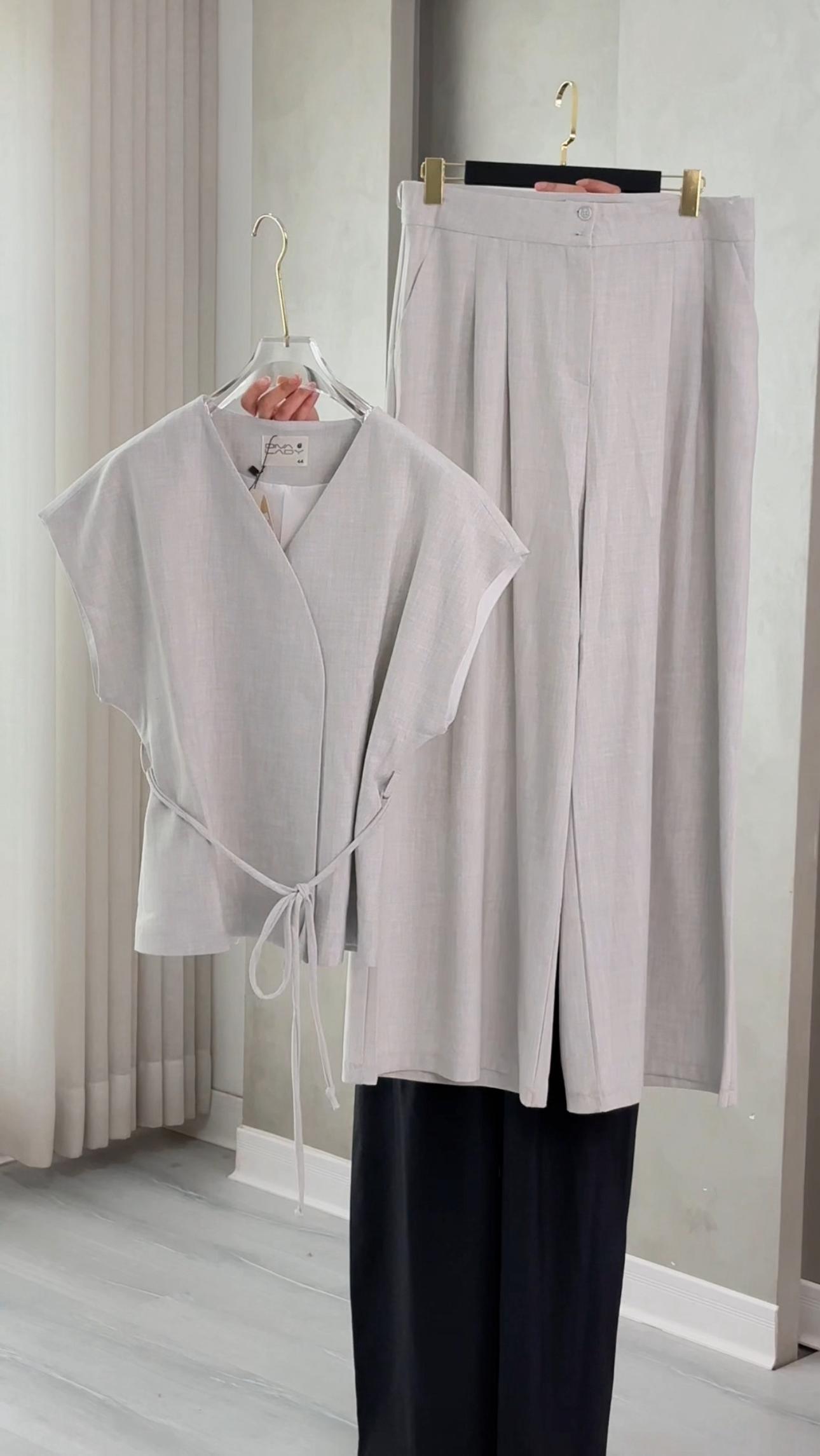 بدلة نسائي من غير اكمام