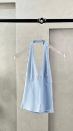 توب نسائي بفتحة صدر