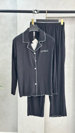 بيجامة نسائي بازرار بسيطة