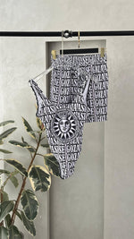 طقم ملابس سباحة بطبعة الشمس