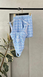 طقم ملابس سباحة بطبعة الشمس