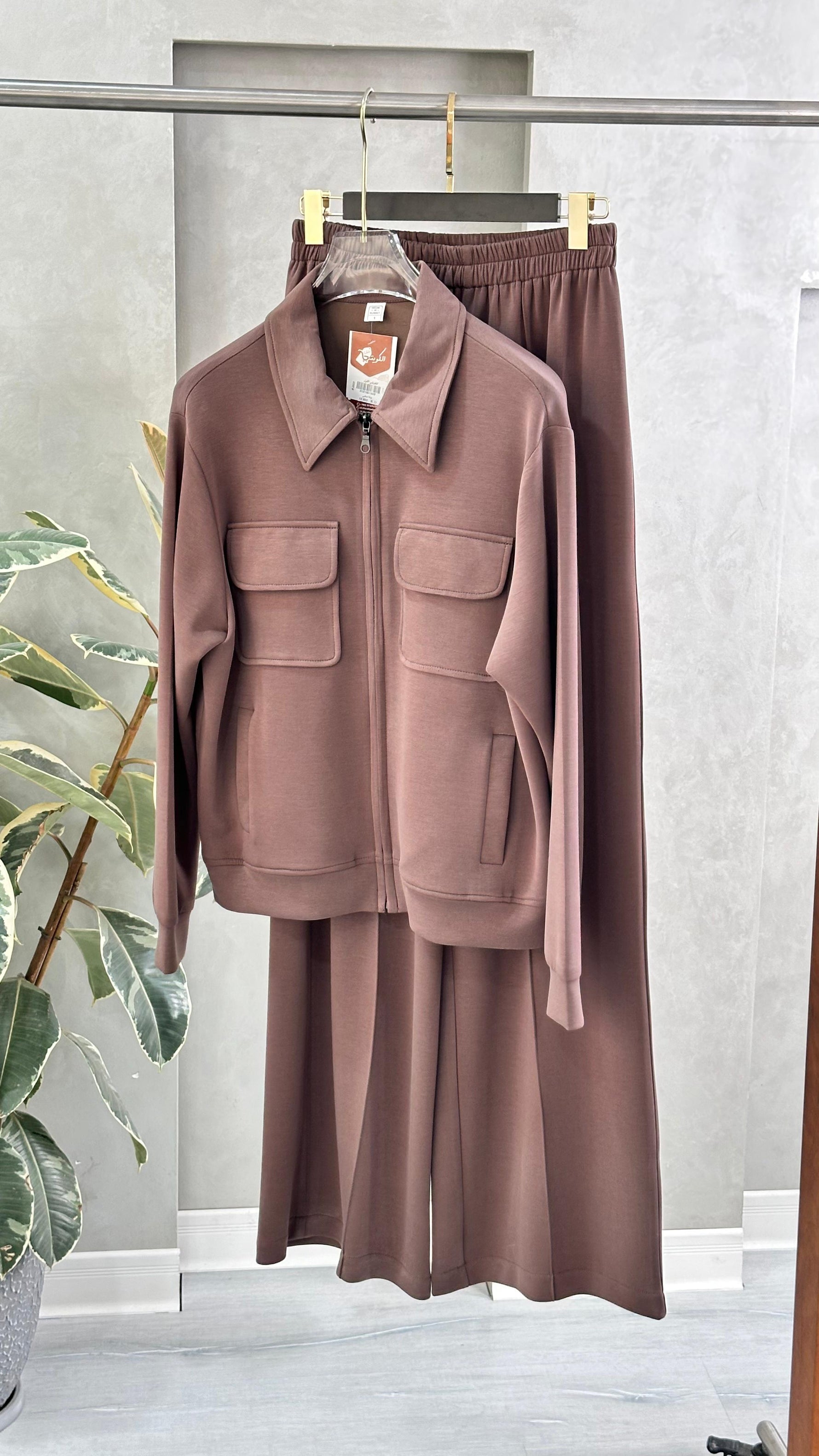 بدلة نسائي بجيوب