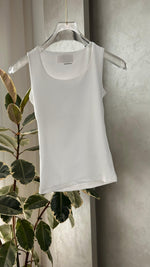 توب نسائي من غير اكمام