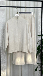 بدلة نسائي بياقة مرتفعة