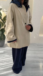 جاكيت ترنش كوت قصير بلمسة رياضية