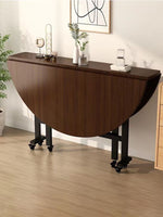 طاولة طعام مستديرة قابلة للطي