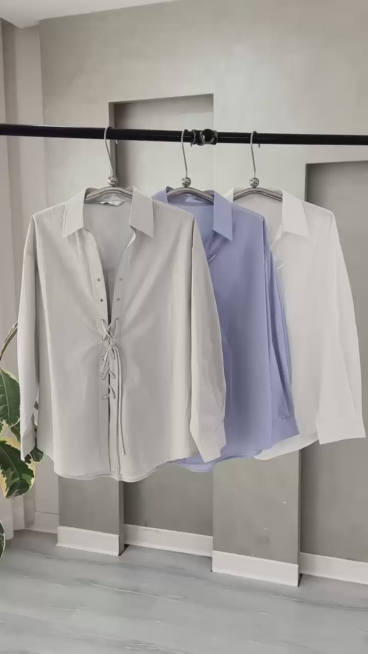 قميص نسائي بازرار