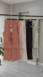 بدلة نسائي برباط من الصدر