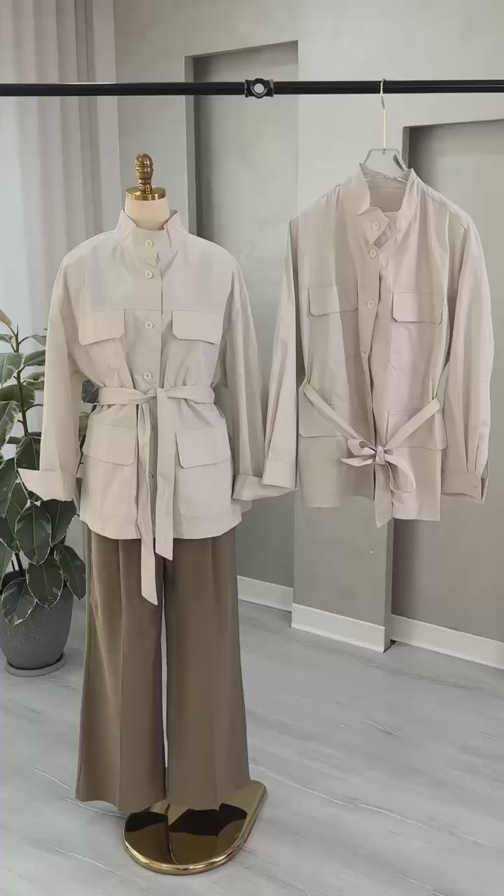 جاكيت نسائي بحيوب وحزام